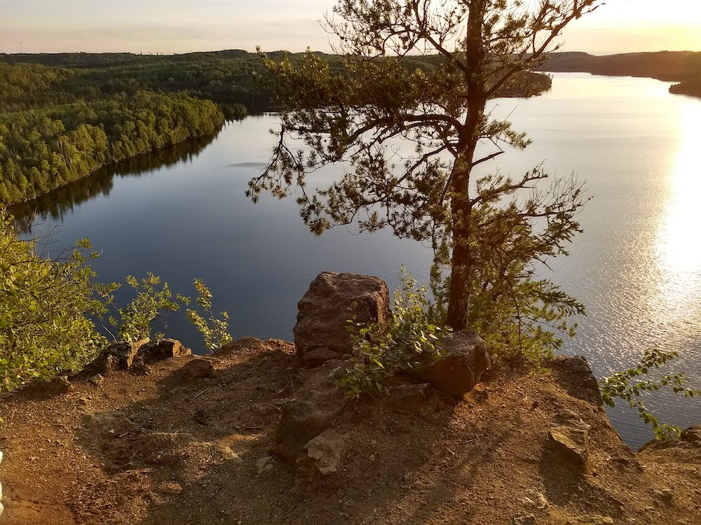 overlooking a lake at sunset