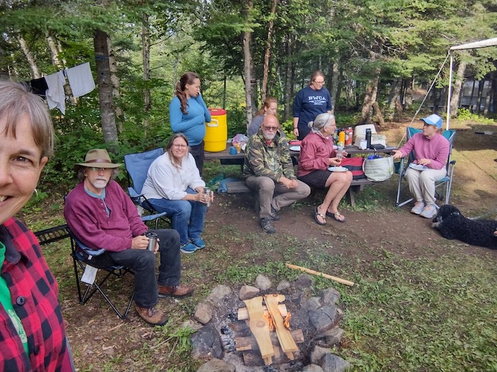 campers visiting at the campsite