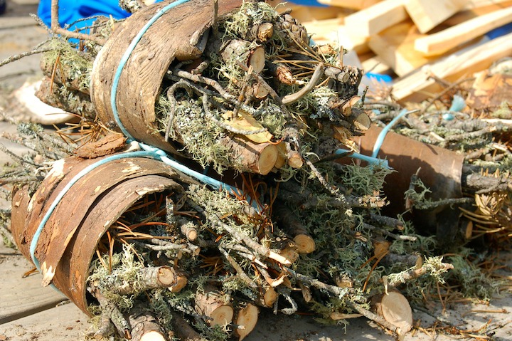 Bundles of birch bark and twigs tied as fire starter