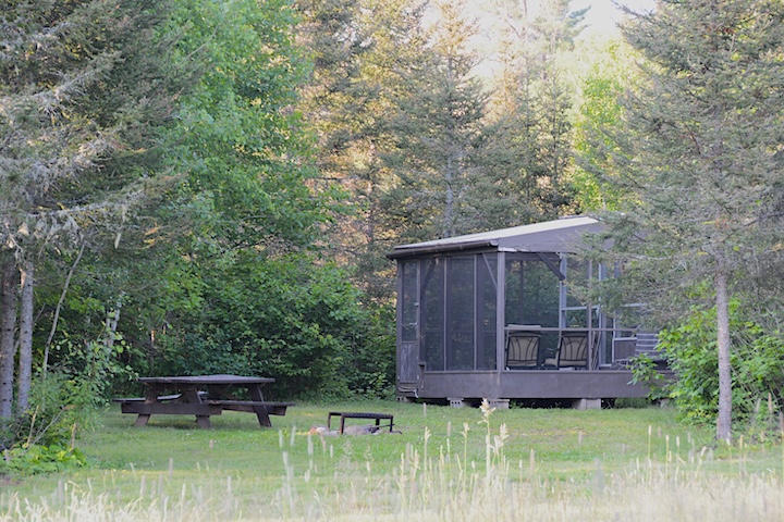 picnic table and screen room on Campsite 20 at Okontoe Family Campground