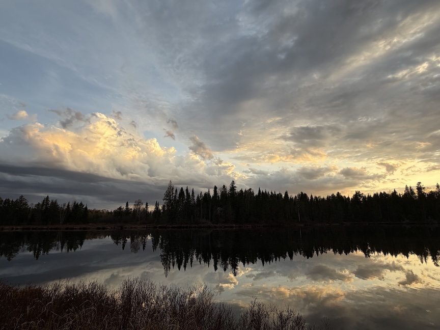 beautiful clouds over Bow Lake at sunset